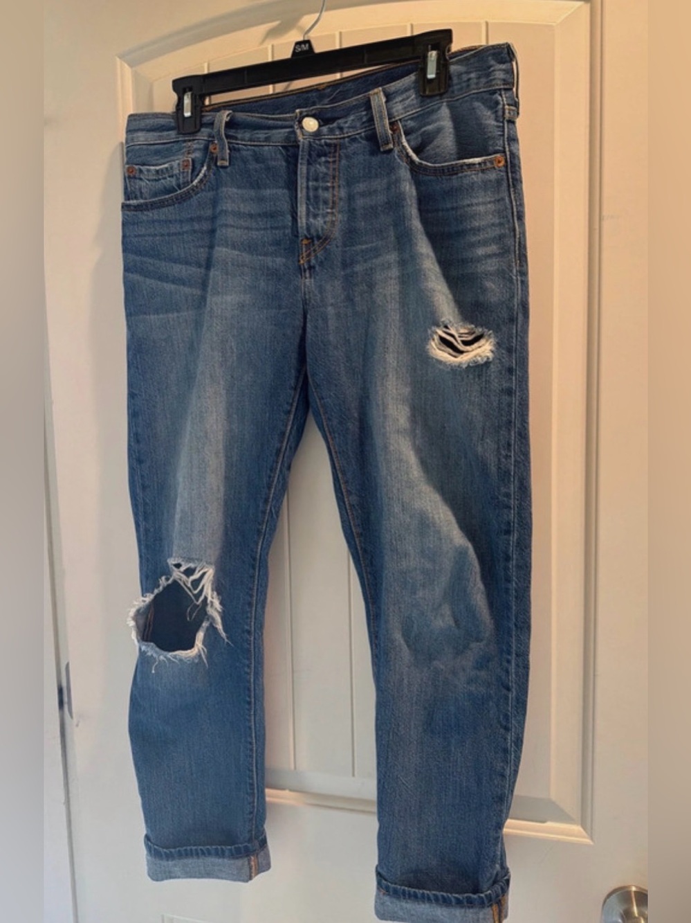 Levi’s 501 distressed jeans